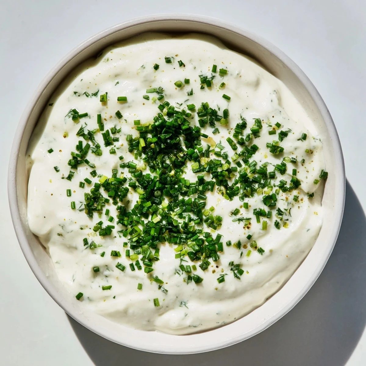 Tangy, vibrant Veggie Ranch Dip, a cool snack to serve alongside a colorful veggie assortment.