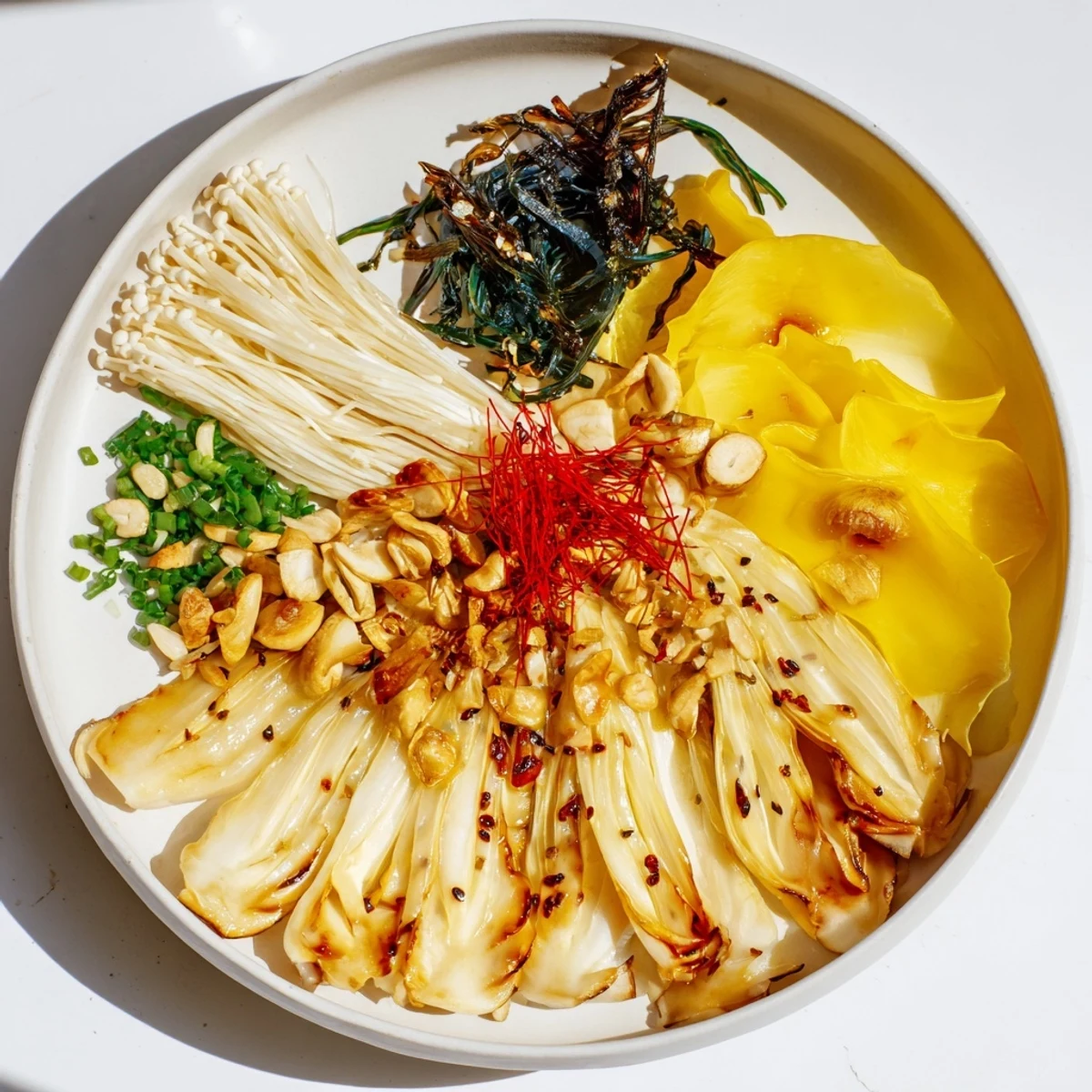 A close-up of the Umami Bomb Asian Delight, showcasing vibrant colors and fresh herb garnishes.