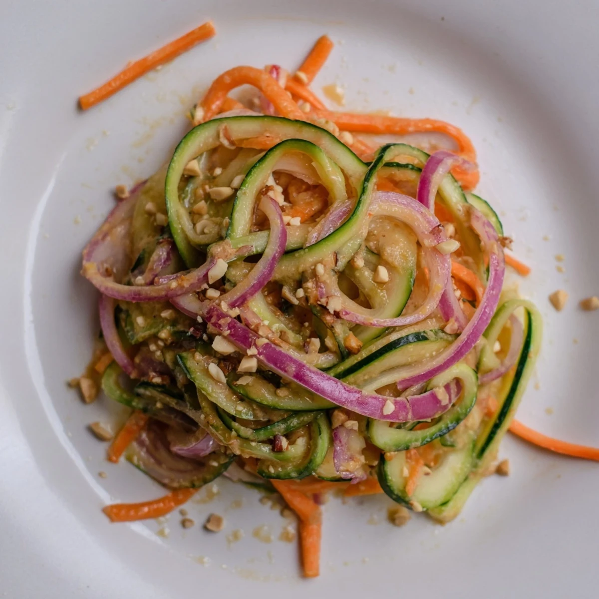 Fresh and vibrant Thai-Style Peanut Cucumber Salad, with bright herbs and crunchy cucumbers.