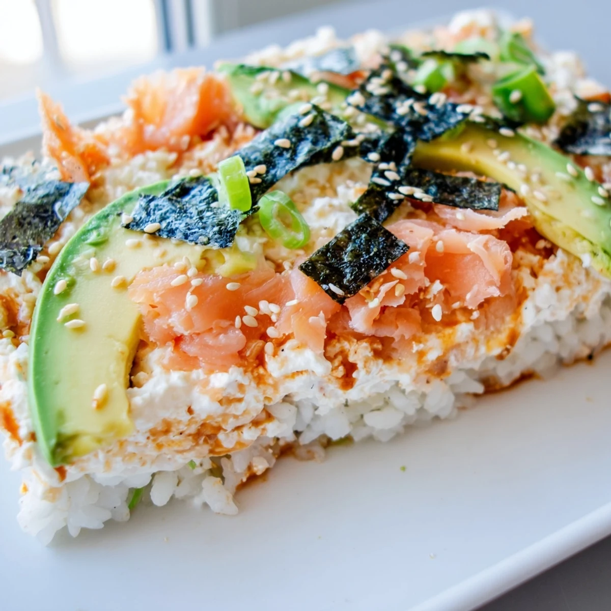 Creamy Sushi Bake casserole, a comforting deconstructed sushi dish, baked until slightly bubbly with salmon.