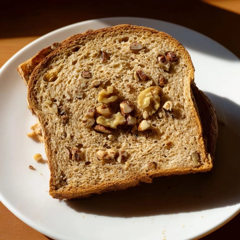 Warm, soft inside of Nutty Whole Wheat Loaf Bread, ready to be sliced for a delicious meal.